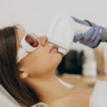 Woman undergoing laser facial hair removal treatment at Venus Skin Clinic, Nungambakkam